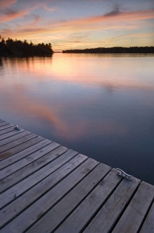 Sunset from wooden dock, Whispering Pines, Lake Kabetogama, Voyageurs National Park Sunset from wooden dock, Whispering Pines, Lake Kabetogama, Voyageurs National Park