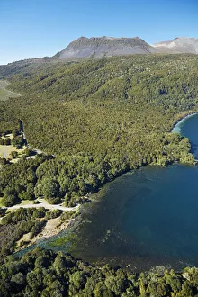 Te Tapahoro Bay, Lake Tarawera flowing into Tarawera River, and Mount Tarawera, near Rotorua Te Tapahoro Bay, Lake Tarawera flowing into Tarawera River, and Mount Tarawera, near Rotorua