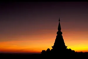 Thailand, Doi Inthanon Mountain. Sunset silhouette of Buddhist Chedi (temple) Phra Thailand, Doi Inthanon Mountain. Sunset silhouette of Buddhist Chedi (temple) Phra