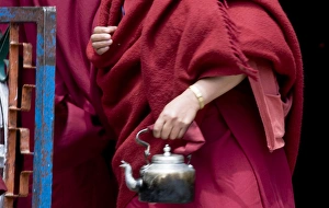 Thukje Chuling Nunnery in Tawang, Arunachal Pradesh, northeast India, hands of a Thukje Chuling Nunnery in Tawang, Arunachal Pradesh, northeast India, hands of a