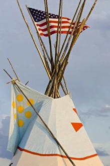 Tipi with American flag at the North American Indian Days celebration in Browning Montana Tipi with American flag at the North American Indian Days celebration in Browning Montana