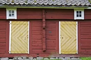 Images Dated 7th August 2004: Traditional style Swedish wooden painted house. A door Smaland region. Sweden, Europe
