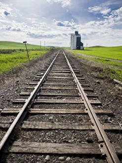 Train tracks and grain elevator in Eastern Washington Train tracks and grain elevator in Eastern Washington