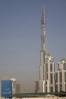 United Arab Emirates, Dubai. Burj Dubai Hotel, with an Arabic sign in lower left United Arab Emirates, Dubai. Burj Dubai Hotel, with an Arabic sign in lower left