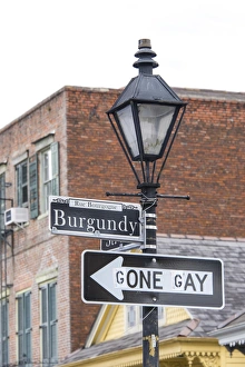 US, LA, New Orleans, French Quarter. Traffic sign amended US, LA, New Orleans, French Quarter. Traffic sign amended