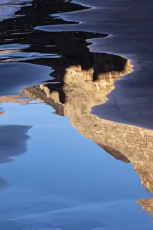 USA, Arizona. Canyon wall reflections on a sand beach, Grand Canyon National Park USA, Arizona. Canyon wall reflections on a sand beach, Grand Canyon National Park