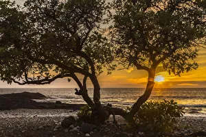 USA, Hawaii, Wawaloli Beach Park. Ocean beach at sunset USA, Hawaii, Wawaloli Beach Park. Ocean beach at sunset