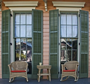 USA, Louisiana, New Orleans, Garden District. Two rocking chairs and a coffee mug USA, Louisiana, New Orleans, Garden District. Two rocking chairs and a coffee mug