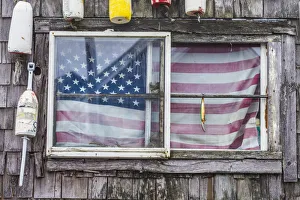 USA, Massachusetts, Cape Ann, Rockport. Fishing shack with US flag USA, Massachusetts, Cape Ann, Rockport. Fishing shack with US flag