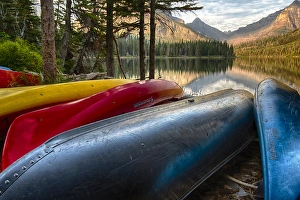 USA, Montana, Glacier National Park. Two Medicine Lake with canoes in foreground USA, Montana, Glacier National Park. Two Medicine Lake with canoes in foreground
