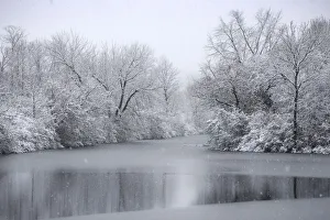 USA, New York State. Winter snowfall on the Erie Canal, Cedar Bay Park USA, New York State. Winter snowfall on the Erie Canal, Cedar Bay Park