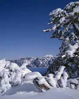 USA, Oregon, Crater Lake National Park. Winter snow accumulates at Crater Lake USA, Oregon, Crater Lake National Park. Winter snow accumulates at Crater Lake