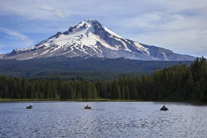 USA, Trillium Lake, fishermen on Trillium Lake in front of Mt. Hood USA, Trillium Lake, fishermen on Trillium Lake in front of Mt. Hood