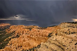 USA, Utah, Bryce Canyon National Park. Sunrise on storm clouds and sandstone hoodoo formations USA, Utah, Bryce Canyon National Park. Sunrise on storm clouds and sandstone hoodoo formations