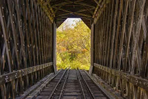 USA, Vermont, Fall foliage seen off Rt. 15, Wolcott, Fisher Covered Railroad Bridge (1908), Lamoille County USA, Vermont, Fall foliage seen off Rt. 15, Wolcott, Fisher Covered Railroad Bridge (1908), Lamoille County