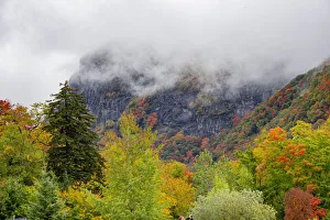USA, Vermont, New England, Stowe Mt. Mansfield parking lot view with fog on mountains USA, Vermont, New England, Stowe Mt. Mansfield parking lot view with fog on mountains