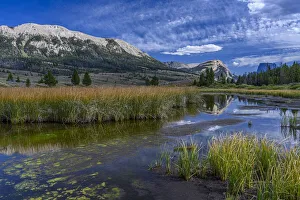 USA, Wyoming. White Rock Mountain and Squaretop Peak above Green River wetland USA, Wyoming. White Rock Mountain and Squaretop Peak above Green River wetland