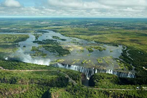 Victoria Falls or Mosi-oa-Tunya (The Smoke that Thunders), and Zambezi River Victoria Falls or Mosi-oa-Tunya (The Smoke that Thunders), and Zambezi River