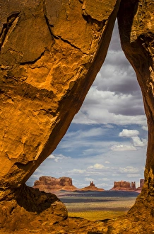 View through the Teardrop Arch into Monument Valley Tribal Park of the Navajo Nation View through the Teardrop Arch into Monument Valley Tribal Park of the Navajo Nation