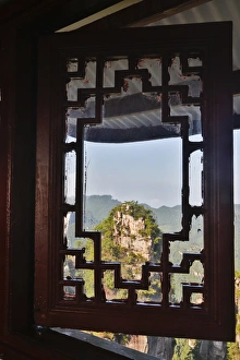 View through window at Moutains of Yellow Stone Village the first national forest park in View through window at Moutains of Yellow Stone Village the first national forest park in