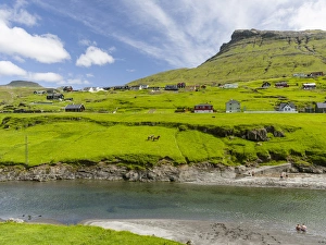 Village Leynar. The island Streymoy, one of the two large islands of the Faroe Village Leynar. The island Streymoy, one of the two large islands of the Faroe