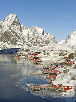 Village Reine on the island Moskenesoya. The Lofoten Islands in northern Norway during Village Reine on the island Moskenesoya. The Lofoten Islands in northern Norway during