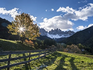 The Villnoess valley in the Dolomites during autumn. The peaks of the Geisler Mountain The Villnoess valley in the Dolomites during autumn. The peaks of the Geisler Mountain