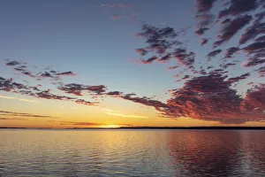 Vivid sunrise clouds over Fort Peck Reservoir in the Charles M Russell National Wildlife Vivid sunrise clouds over Fort Peck Reservoir in the Charles M Russell National Wildlife