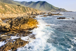 Waves create surf on rocks. Garrapata State Beach, Big Sur, California Pacific Coast. US Waves create surf on rocks. Garrapata State Beach, Big Sur, California Pacific Coast. US