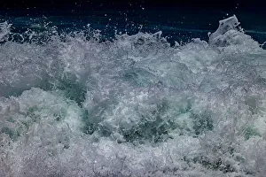Waves foaming and bubbling when they hammer the sandy beach at Sunset Beach Waves foaming and bubbling when they hammer the sandy beach at Sunset Beach