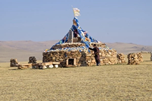 Western Mongolia. An ovoo, a sacred cairn, part of Mongolian shamanic traditions Western Mongolia. An ovoo, a sacred cairn, part of Mongolian shamanic traditions