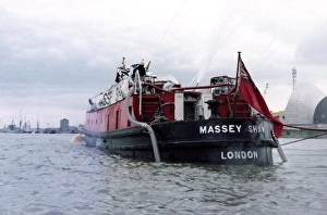 Massey Shaw fireboat in action, River Thames, London Massey Shaw fireboat in action, River Thames, London