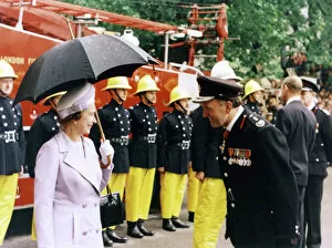 Images Dated 31st May 1977: Queen Elizabeth II inspecting firefighters, London