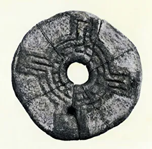 Sun-wheel on a Celtic quern, Ireland Sun-wheel on a Celtic quern, Ireland
