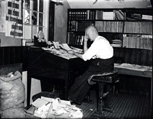 Petworth House gardener in his study Petworth House gardener in his study