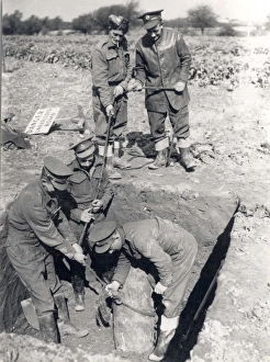 West sussex record office/lalouette/royal engineers bomb disposal team work West sussex record office/lalouette/royal engineers bomb disposal team work