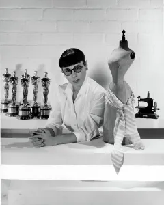 Vintage Fashion Designers Prints: EDITH HEAD, posing with Oscars she has won