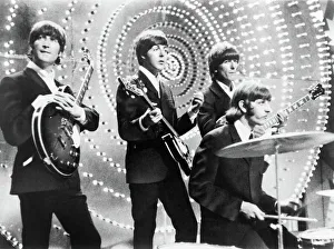 THE BEATLES, c1964. The Beatles in concert. Photograph, c1964 THE BEATLES, c1964. The Beatles in concert. Photograph, c1964