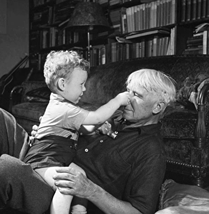 CARL SANDBURG (1878-1967). American writer. With his grandson at the Chikaming Goat Farm CARL SANDBURG (1878-1967). American writer. With his grandson at the Chikaming Goat Farm