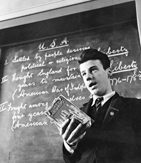Vintage Classroom Decor Prints: CLASSROOM, c1940. A prefect at the head of a classroom, reading from The History