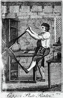 COPPER PLATE PRINTER, 1807. A copper plate printer. Wood engraving from The Book of COPPER PLATE PRINTER, 1807. A copper plate printer. Wood engraving from The Book of