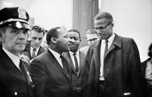 Dr. Martin Luther King Jr. (left), American cleric and civil rights leader, photographed with American religious and political leader Malcolm X, before a press conference in Washington, D.C., 26 March 1964