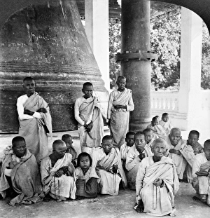 A group of Buddhist monks in front of the Great Bell of Mingoon at the temple, Mingoon A group of Buddhist monks in front of the Great Bell of Mingoon at the temple, Mingoon
