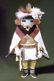 HOPI KACHINA DOLL. Talavai (Morning Singer), a Hopi spirit or Kachina, dressed in a cape and headdress HOPI KACHINA DOLL. Talavai (Morning Singer), a Hopi spirit or Kachina, dressed in a cape and headdress