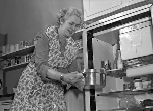 HOUSEKEEPER, 1942. A housekeeper in the kitchen. Photograph by Ann Rosener, 1942 HOUSEKEEPER, 1942. A housekeeper in the kitchen. Photograph by Ann Rosener, 1942