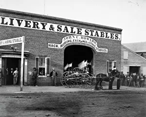 John C. Howards livery stable and saloon on G Street in Washington, D.C. where John H John C. Howards livery stable and saloon on G Street in Washington, D.C. where John H