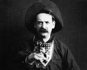 Justus D. Barnes in the film The Great Train Robbery made by the Edison Company in 1903 Justus D. Barnes in the film The Great Train Robbery made by the Edison Company in 1903