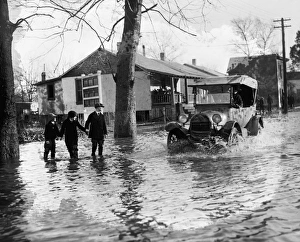 MARYLAND: FLOOD, 1926. A flooded street in Bladensburg, Maryland MARYLAND: FLOOD, 1926. A flooded street in Bladensburg, Maryland
