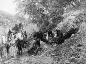 Edward S Curtis Images Prints: APACHE MEN, c1906. Storytelling. An Apache man marks the ground with a stick