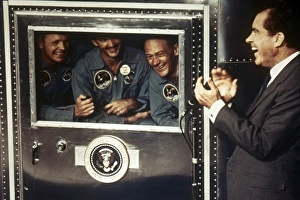 SPACE: APOLLO 11. President Richard M. Nixon applauds astronauts Neil Armstrong, Michael Collins SPACE: APOLLO 11. President Richard M. Nixon applauds astronauts Neil Armstrong, Michael Collins